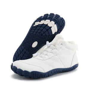 Snowy barefoot winter boot in white with navy sole, angled pair view beside the sole tread
