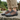 Trailblazer barefoot hiking shoe in dark grey with orange, worn as a pair on a stone patio, three quarter view