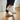 Summit barefoot hiking shoe in cream beige, worn stepping up wooden stairs