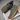 Ease barefoot slip on shoe in olive green, top down view of the pair and toggle drawstring