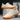 Ease barefoot slip on shoe in cream, pair displayed on a box showing the gum sole