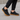 Ease barefoot slip-on shoe in black, lifestyle view