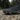 Summit barefoot hiking shoe for men in black, close up of the rugged toe and tread on gravel