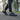 Wave barefoot sneaker for men in navy blue, worn at a city crosswalk at dusk, side view