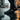 Terra barefoot trainer for men in black, worn on a wet city street at dusk, three quarter view