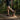 Cascade barefoot sneaker for men in grey with orange, running on a forest trail, side view