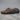 Trailblazer barefoot hiking shoe for men in dark grey with orange, studio pair on concrete, side view