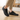 Cascade barefoot sneaker in black with grey, worn on a wood floor at home, side view