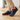 Grove barefoot sneaker in navy, worn standing on a wood floor at home showing the wide toe box