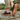 Sage barefoot sneaker in brown worn stepping on stone, view of the honeycomb sole