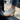 Ease barefoot slip on shoe in cream, close up worn stepping out of a car