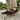 Loafers barefoot slip on shoe in black worn on a stone path, front view for men