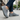Breeze barefoot sneaker in grey worn walking a city sidewalk