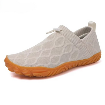 Ease barefoot slip on shoe in cream, three quarter view showing the textured knit upper and gum sole