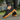 Ease barefoot slip on shoe for men in black, worn walking on paving with gum sole