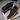 Ease barefoot slip on shoe in black, top down view of the pair showing red lining